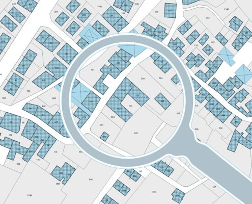 Magnifying glass focused on map of city