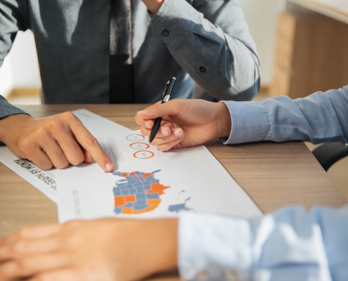 Site selection consulting team reviewing location strategy