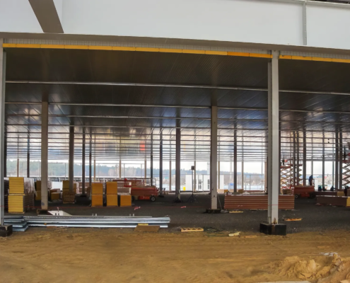 Construction site with idle equipment illustrating relocation delays and rising project costs