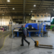 Production floor of mid sized manufacturers expanding operations