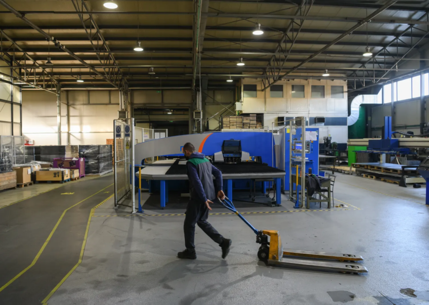 Production floor of mid sized manufacturers expanding operations